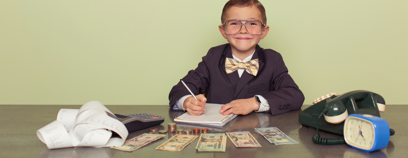Boy sitting at a desk.